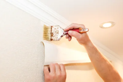 Pose de papier peint à Serruelles — revêtements muraux et toiles de verre